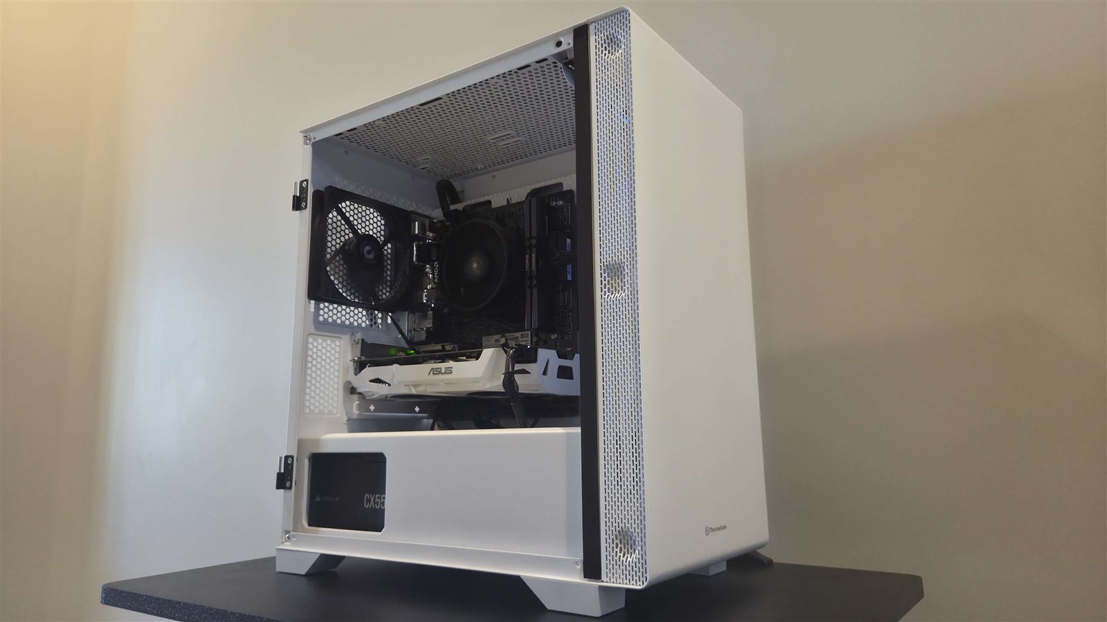 White gaming PC with tempered glass side panel